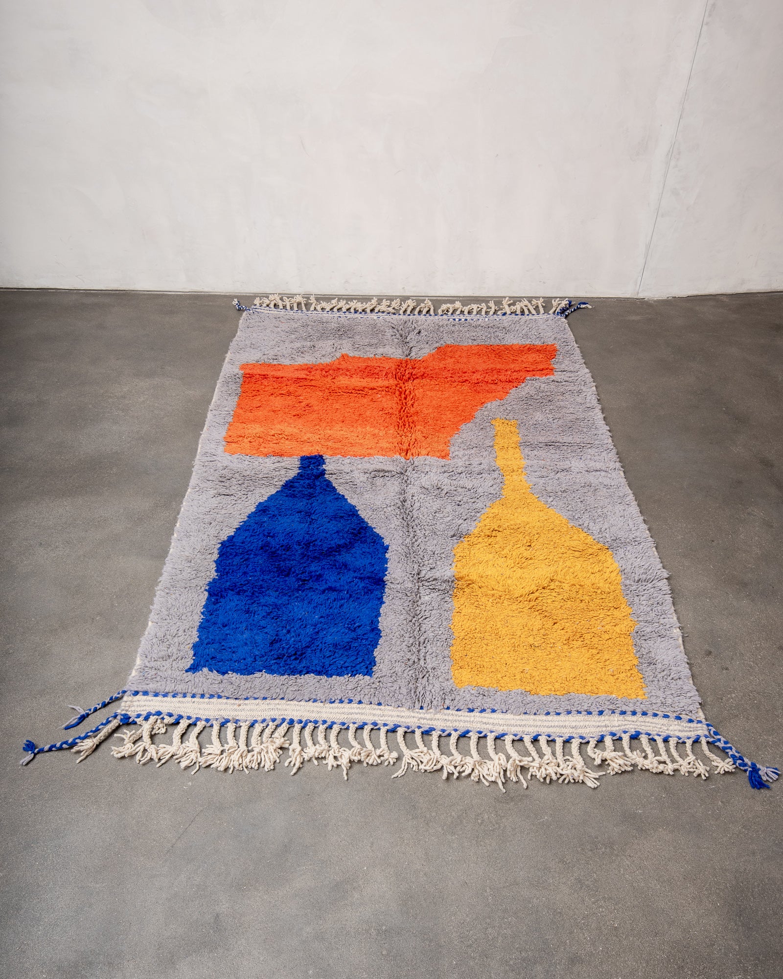 Modern, designer, handcrafted Berber rug from Morocco. Beniourain carpet with beautiful colours and patterns and fluffy wool texture.